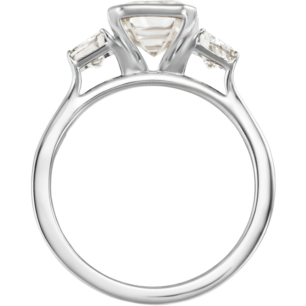 2.5 carat emerald cut lab grown diamond three stone ring in 14K white gold on finger