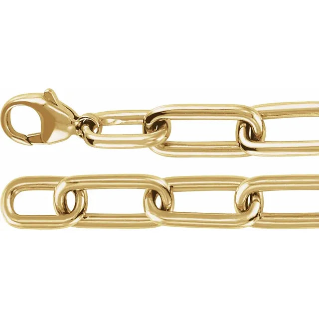 Close-up detail of the lobster clasp and paperclip links on the 14K yellow gold 1.5 CTW lab-grown diamond bracelet