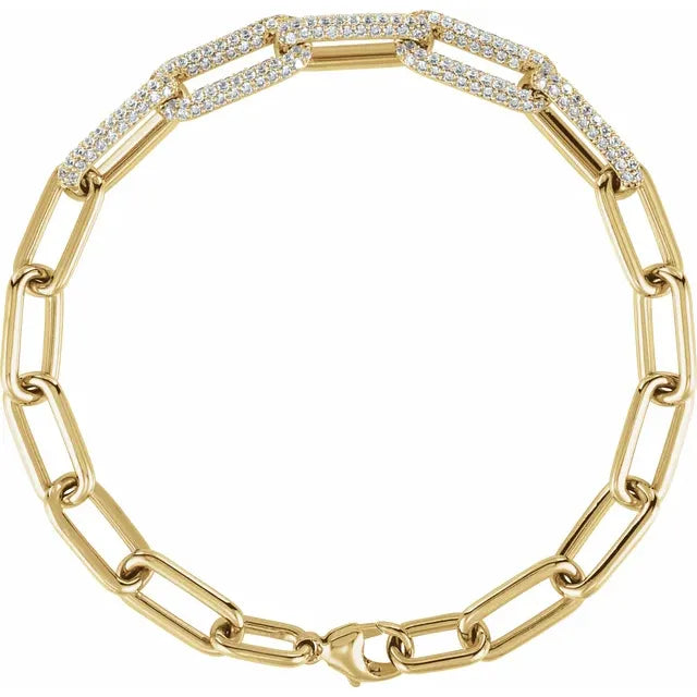 14K yellow gold paperclip-style bracelet with 1.5 CTW lab-grown diamonds, shown in a circular flat lay view | JC Fine Jewelry