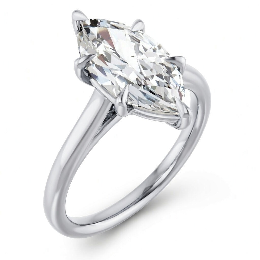 Top-down view of 2.5ct marquise lab grown diamond solitaire engagement ring in luxurious 18K white gold