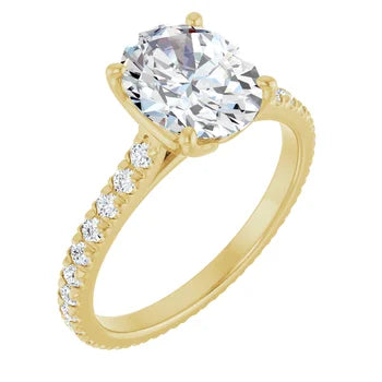 2.7 CT oval diamond accent ring in 14K yellow gold shown from the front. Features a brilliant round lab-grown diamond center stone with delicate pavé accents along the shank.