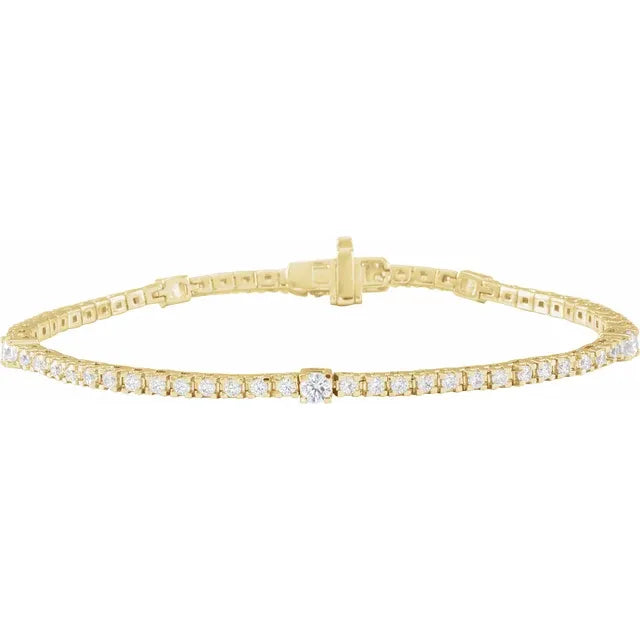 Close-up detail of 14K yellow gold Whispering Sparkle Diamond Line Bracelet showing diamond settings and clasp