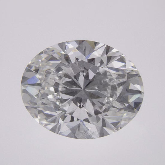 360-degree close-up video of a brilliant 1.41 CT oval lab-grown diamond. Showcasing exceptional sparkle, fire, and light performance from every angle against a clean white background.