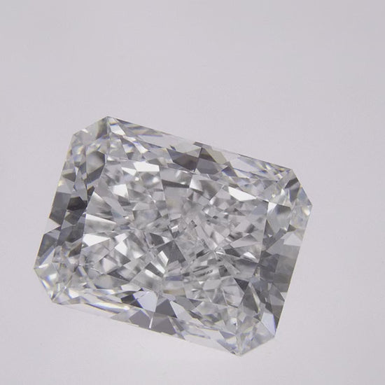 60-degree close-up video of a 2.50 CT emerald cut lab-grown diamond showcasing its step-cut facets, fire, and exceptional sparkle from every angle