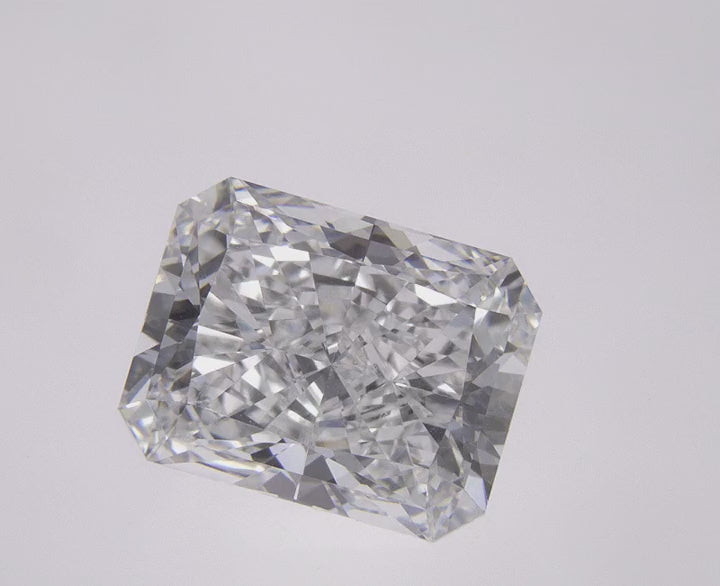 60-degree close-up video of a 2.50 CT emerald cut lab-grown diamond showcasing its step-cut facets, fire, and exceptional sparkle from every angle